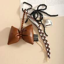 A DIY Bow-Shaped Hanging Ornament With Braiding And Heart Combination Decorations, Very Unique, Available In Multiple Colors. It Can Be Used As A Hanging Accessory In Cars, A Decoration For Women's Handbags, Bag Accessories, Backpack Accessories, Keychain Hangers, Personalized Gifts, Gifts For Children, Halloween, Birthdays, Back-To-School, Travel Souvenirs, Party Gatherings, Couple Gifts, And Wedding Gifts.