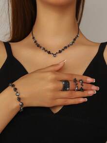 1 套时尚珠宝，包括项链、耳环、手镯，适合女性日常佩戴、婚礼、派对等。