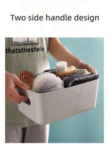 1 pièce de boîte de rangement blanche minimaliste avec des lignes lisses et une forme carrée nette, dotée d'une conception de poignée intégrée très conviviale. Fabriquée en plastique de haute qualité, elle est robuste et facile à nettoyer. Qu'il s'agisse de petits articles de beauté dans la chambre ou de bouteilles et bocaux d'assaisonnement dans la cuisine