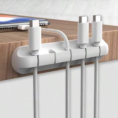 新款线缆夹，适用于耳机、充电线、鼠标等。简约多功能设计，背面自带粘胶，方便线缆管理，可整理 USB 线缆，也可作为办公桌、汽车、家庭和办公室的线缆固定器。