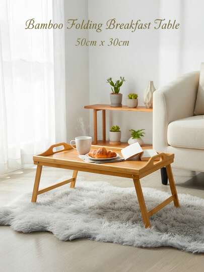 Une table pliante, table à plateau en bambou multifonctionnelle pour la chambre à coucher de la maison, fabriquée à partir de palettes en bois, design simple