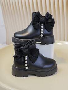 1 par de botas de bebé de moda y versátiles para otoño/invierno, con un gran lazo negro y decoración de perlas, elegante y llamativo, que combina perfectamente con vestidos de princesa o pantalones casuales - Negro - Ver 6