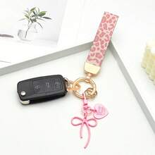 1 breloc elegant din piele PU imprimat cu inel din aliaj de zinc rezistent la rugină, accesoriu de modă pentru femei la modă, potrivit pentru chei auto, chei de ușă și cadouri, breloc, breloc la modă, durabil și robust.