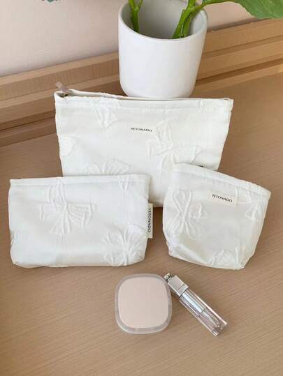 1 PC White Bow Clutch Bag For Travel And All-Match Portability Back To School Make Up Bag, Fashionable And Casual Large Capacity Portable Zipper Makeup Bags, Travel Storage Stationery Storage, Vacation Essentials Cosmetic Bags For Pouch Pads, Wired Earphones, Earpods, Headphones, Charger, Lipsticks, Perfume, Skin Care And Beauty Products