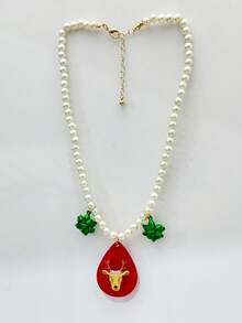 1 pieza Collar de Navidad para mujer, collar de cuentas de perlas falsas, estampado de reno de acrílico rojo, collar colgante con flor de Navidad verde, adecuado como regalo de fiesta de Navidad para mujeres
