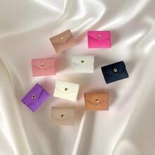 1 pieza Bolsa de joyas pequeña y multifuncional portátil, bolsa de belleza, bolsa de cierre de periódico mini para almacenar aretes, anillos, collares, bolsa de maquillaje, esencial de viaje, útiles escolares, esencial de vacaciones