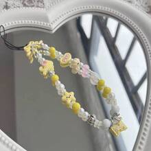 Braccialetto delicato con ciondoli a forma di stella gialla, fiocco e cuore, catena e laccetto da polso per donna