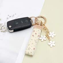 1 breloc elegant din piele PU imprimat cu inel din aliaj de zinc rezistent la rugină, accesoriu de modă pentru femei la modă, potrivit pentru chei auto, chei de ușă și cadouri, breloc, breloc la modă, durabil și robust.