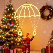 1个圣诞老人降落伞灯，创意圣诞老人降落伞造型，USB供电，多种照明模式，适合冬季和圣诞节装饰，可用于圣诞树、客厅、卧室、餐厅玻璃和墙面装饰。