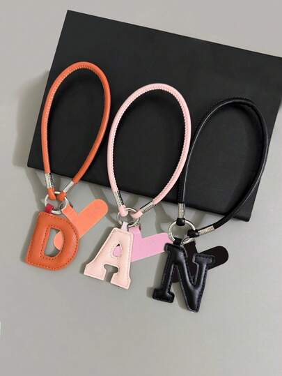 1pc Leather English Letter Keychain Pendant, Phone Case Strap, Sturdy Phone Lanyard With Cushion Pad