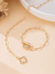 1 Set di Gioielli Donna Moda Classica Versatile Elegante Lusso Ciondolo a Quadrifoglio Cavo con Strass e Bracciale