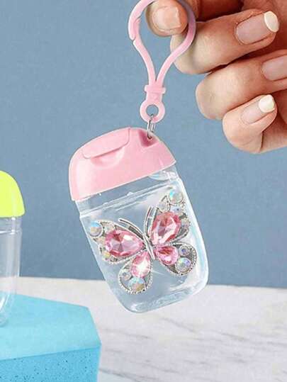 Botella vacía transparente rosa con desinfectante de manos, decoración de diamante brillante con amor, 30ml, llavero con soporte, tapa rosa, la tapa se puede reutilizar, la botella vacía se puede rellenar, recipiente para cosméticos, adecuado para lociones líquidas, artículos de viaje, artículos de dormitorio, adecuado para mujeres, madres, maestros, amigos, estudiantes, regreso a la escuela y maestros, regalos del Día de la Madre, regalos del Día de San Valentín, 1 onza (aproximadamente 28,3 gramos)