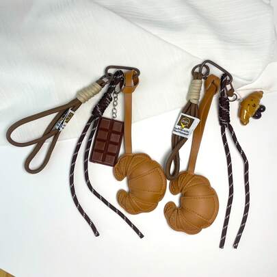 1 件创意时尚牛角巧克力钥匙扣、包包挂饰、时尚吊坠、皮革牛角配饰，生日派对、周年纪念、毕业典礼、感恩节的理想礼物，适合日常使用和装饰圣诞节