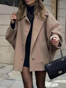 Manteau ample élégant pour femmes, col à revers, boutons devant, poches, couleur unie. Minimaliste et , pour l'automne/l'hiver