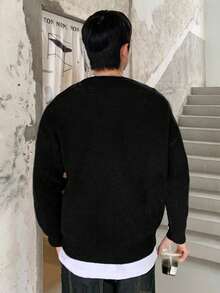 1pc Teen Boys Casual Outdoor Cool Fashion Angel Shooting Heart Jacquard Black Long Sleeve Sweater, Slouchy Crew Neck Knit Pullover, Warm & Thick, Suitable For Spring, Autumn & Winter