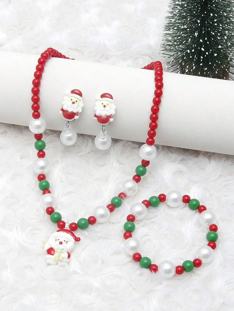 Conjunto de joyería de 4 piezas para niñas con encantos de Papá Noel, incluyendo pulsera, brazalete, aretes y collar, adecuado para fiestas navideñas, con cuentas de colores aleatorios