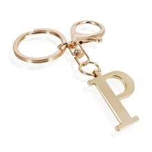 1 Stück hochwertiger und eleganter Schlüsselanhänger mit Goldbuchstaben, dreidimensionaler Anhänger mit Buchstaben A-Z, stilvoller Schlüsselanhänger aus Legierung, Charm für Tasche, Rucksack, Autoschlüssel, perfektes Accessoire für den täglichen Gebrauch von Frauen, tolles Geschenk für Paare, klassischer und einfacher Schlüsselanhänger, Dekoration, Taschenzubehör, geeignet als Geschenk für Freunde, Familie, Paare, Freundinnen, wichtige Geschenke, Urlaubssouvenirs