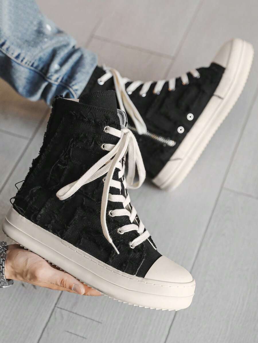 Zapatos casuales de lona de estilo personalizado de moda para hombres en otoño/invierno, botas de estilo de cremallera y flecos desgastados de suela de goma marfil de nicho de alta top