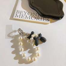 1 pièce Pendentif de chien en perle, décoration suspendue en chaîne de perles, porte-clés de chien en ballon de perle DIY, accessoire de chaîne de téléphone en perle plissée, décoration suspendue de téléphone à la mode pour dame, peut être utilisé comme caméra, sac, éventail à main, décoration de porte-clés compatible avec Android et la plupart des smartphones, cadeaux pour mère, famille, amis, enfants, anniversaire, vacances