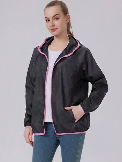 Bộ đồ thể thao nữ gồm áo khoác có mũ kéo khóa, tay dài, nhiều túi, dành cho mùa thu/đông, màu đen.