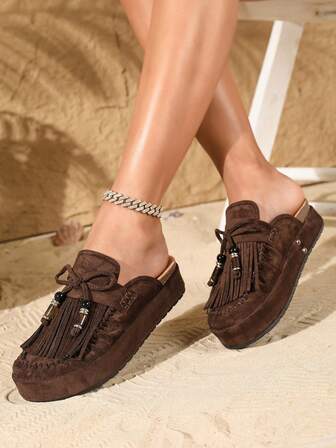 Nuevos zapatos de mujer tipo mula con borlas y lazo en estilo bohemio, suela gruesa, punta cerrada con colgante, sandalias sin talón retro, adecuados para uso diario, citas, viajes, caminatas, combinables con shorts, faldas y ropa casual