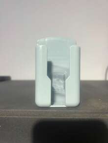 1 pieza Soporte multifuncional para control remoto, soporte de pared para teléfono y organizador, caja de almacenamiento autoadhesiva para el dormitorio, soporte de carga de plástico y soporte para control remoto, caja de almacenamiento para control remoto de aire acondicionado, organizador de almacenamiento de control remoto de silicona, sin taladro, inodoro, estante para control remoto de TV y aire acondicionado