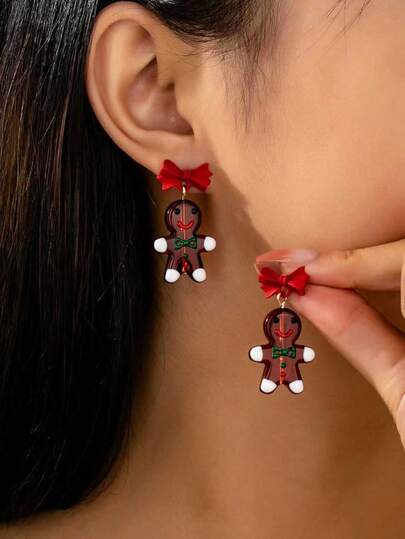 1 par de pendientes colgantes con diseño de hombre de jengibre, pendientes navideños con lazo rojo, joyería festiva de regalo para mujeres