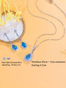 طقم مجوهرات من قلادة وأقراط معلقة مرصعة بحجر المكعب بشكل قطرات ماء لامعة باللون الأزرق الفاتح، هدايا لحفلات الخطوبة والمناسبات للنساء