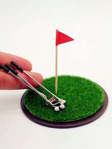 Bộ chơi golf mini, 7 món, sân golf mini để bàn, bao gồm gậy golf, cỏ nhân tạo, mô hình nhà búp bê, đạo cụ cảnh thu nhỏ, mô hình sân cỏ mô phỏng, đồ trang trí sưu tầm theo chủ đề thể thao, bộ quà tặng cho người yêu thích golf gồm gậy golf và bút bi, quà Giáng sinh. - Nhiều màu - Xem 9