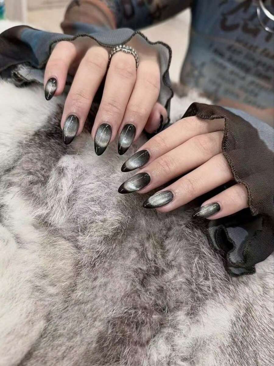 Juego de 24 piezas de uñas acrílicas falsas con diseño de ojo de gato en blanco y negro estilo Y2K, de forma almendrada larga con cielo estrellado en blanco y negro, que incluye 1 parte de pegamento de gelatina y 1 parte de lima de uñas, adecuado para uso diario de mujeres y suministros para fiestas de carnaval