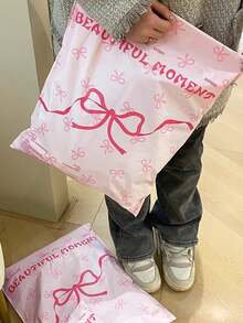 10 piezas Nuevas bolsas de regalo con lazo rosa en forma de corazón para niña, adecuadas para temporada de graduación, boda, fiesta de cumpleaños. Bolsas de plástico gruesas para almacenamiento, cajas, ropa, escuela, oficina, supermercado, transporte, envío y regreso a clases.