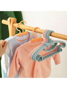 Cuier pentru haine pentru copii, 10 buc/1 buc, fabricat din material PP, suport de uscare a hainelor de acasă, suport pentru haine drăguț, antiderapant și anti-cădere, cuier pentru haine pentru nou-născuți, cuier pentru depozitarea dulapului cu papion, robust și durabil, cu cârlige, cuier multifuncțional pentru haine uscate și umede, două în unu cu fundă, potrivit pentru copii cu vârsta cuprinsă între 0 și 10 ani, cuier și clemă esențiale pentru depozitarea acasă