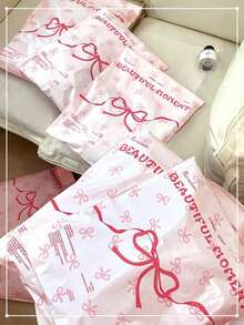 10 piezas Nuevas bolsas de regalo con lazo rosa en forma de corazón para niña, adecuadas para temporada de graduación, boda, fiesta de cumpleaños. Bolsas de plástico gruesas para almacenamiento, cajas, ropa, escuela, oficina, supermercado, transporte, envío y regreso a clases.