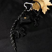 1 件黑咖啡手工编织绳和 PU 皮革迷你包钱包钥匙扣，带蝴蝶结和心形吊饰 - 棕色蝴蝶结、串珠绳和黑白条纹设计，3D 仿皮迷你手提包 - 彩色 - 查看 9