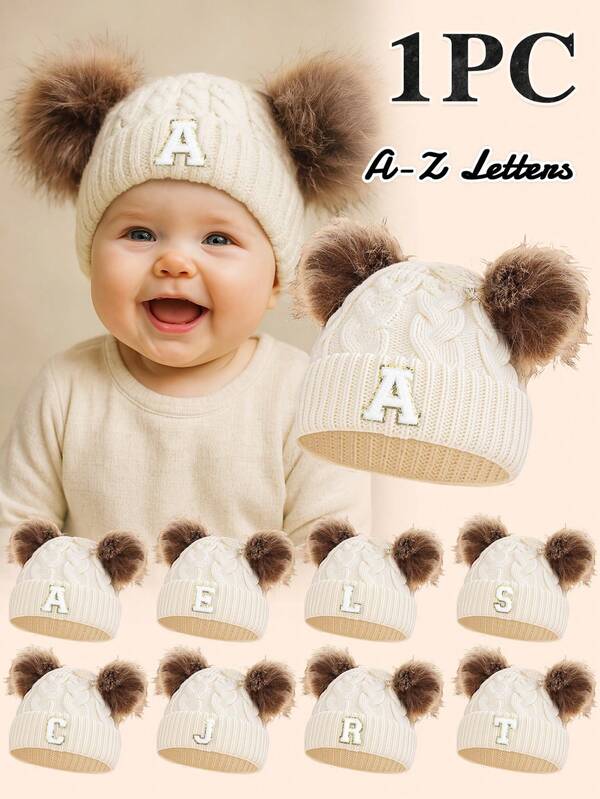 1 peça de gorro de tricô com padrão de 26 letras para bebês com 2 pompons, fofo e moderno, macio e confortável, quente para bebês de 0 a 6 meses no outono/inverno