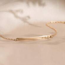 This Exquisite And Simple Narrow Bracelet Can Be Customized With Your Initials, Roman Numerals, Or The Date. Made Of Gold, It Makes A Perfect Gift.