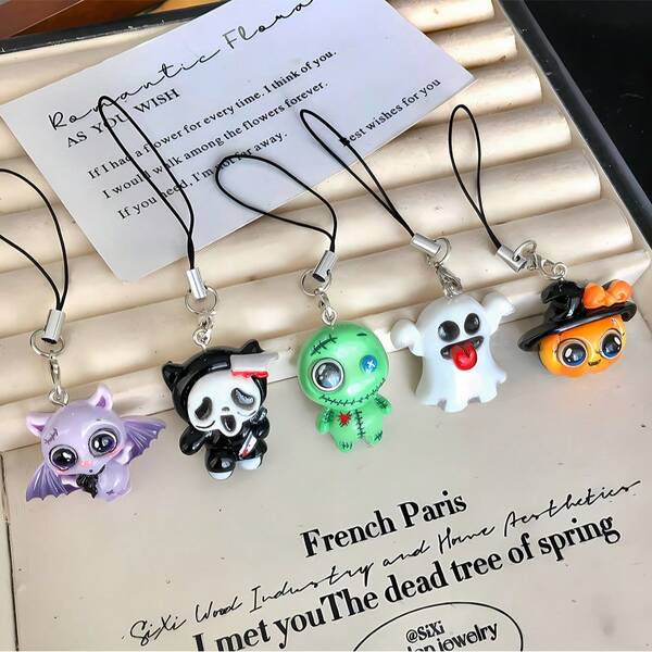 Nuevo accesorio minimalista y lindo de Halloween: colgante de resina pequeño con diseños de calavera, murciélago, calabaza, fantasma y diablo negro para cordón de teléfono, dije de teléfono, accesorio de teléfono, colgante de estuche de auriculares, colgante de bolso