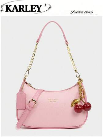 Nuevo bolso de hombro de moda clásico con diseño de decoración de patrón de letra salvaje, de unicolor, de tela impermeable de PU, adecuado para compras, se puede colgar. Con decoración de colgante de cereza, bolso medialuna de verano, vacaciones en la playa, temporada escolar, bolso de mano para damas.