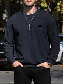 Sudadera holgada de cuello redondo para hombre, con estampado de letras en el pecho. - Negro - Ver 1