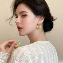 Pendientes de perlas con borlas de flor de osmanto divino para mujeres