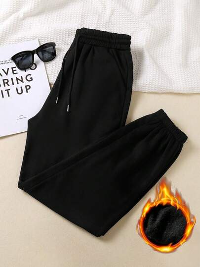 Women's Solid Color Drawstring Pocket Casual Sports Tapered Trousers