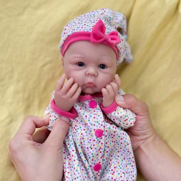 13-Inch Full Soft Silicone Reborn Doll , Colorful Onefit & Big Eyes Expression, Realistic Full-Body Soft Solid Silicone Reborn Doll, Suitable For Children Over 3+ To Play, Give As Christmas, Halloween, Easter,Thanksgiving Gifts And Collect