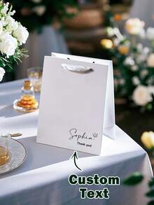 1 Túi Quà Tặng Tùy Chỉnh, Thích Hợp Cho Phù Dâu, Phù Râu, Tiệc Độc Thân/Tiệc Chia Tay, Tiệc Cô Dâu, Tiệc Phù Dâu, Tiệc Cảm Ơn Cô Dâu, Quà Tặng Tiệc Cưới, Quà Cưới Cho Chú Rể, Túi Cầu Hôn Cho Phù Râu, Làm Bằng Giấy Kraft Với Quai Ruy Băng, Túi Giấy Đen Trắng, Túi Quà Màu Đen, Thời Trang, Dễ Thương, Chất Lượng Cao, Tùy Chỉnh, Cá Nhân Hóa, Độc Đáo, Món Quà Lý Tưởng Cho Bạn Trai, Bạn Gái, Bố, Mẹ, Gia Đình, Bạn Bè - Phong cách 4 - Xem 11