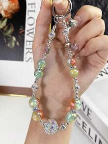 Corona de perlas falsas colgante, Lazo asimétrico de perlas falsas para correa de teléfono, Funda de teléfono con cuentas de cristal, Colgante de bolso, Llavero