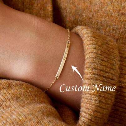 This Exquisite And Simple Narrow Bracelet Can Be Customized With Your Initials, Roman Numerals, Or The Date. Made Of Gold, It Makes A Perfect Gift.