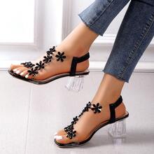 Sandalias de tacón alto para mujeres, modelo 2025, con decoración de flor de strass negra, versátiles y elegantes, adecuadas para uso exterior, eventos y sesiones de fotos