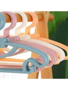 Cuier pentru haine pentru copii, 10 buc/1 buc, fabricat din material PP, suport de uscare a hainelor de acasă, suport pentru haine drăguț, antiderapant și anti-cădere, cuier pentru haine pentru nou-născuți, cuier pentru depozitarea dulapului cu papion, robust și durabil, cu cârlige, cuier multifuncțional pentru haine uscate și umede, două în unu cu fundă, potrivit pentru copii cu vârsta cuprinsă între 0 și 10 ani, cuier și clemă esențiale pentru depozitarea acasă