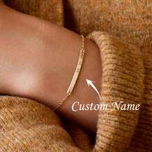 This Exquisite And Simple Narrow Bracelet Can Be Customized With Your Initials, Roman Numerals, Or The Date. Made Of Gold, It Makes A Perfect Gift.