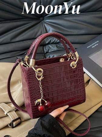 Handväska med stor kapacitet för kvinnor, vinröd färg, justerbar axelrem, kan användas som axelväska eller tote-väska, med körsbärsnyckelringsdekor, trendig vinröd väska