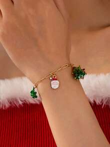 1 Pza Pulsera de Encantos Navideños - Pulsera de Cadena Tono Dorado con Lazo Navideño y Dije de Árbol de Navidad - Joyería Festiva de Elementos Navideños como Regalo para Mujeres y Niñas